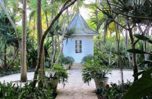 Photo by Oscar de la Renta of his Punta Cana gardens in the Dominican Republic - hut.jpg
